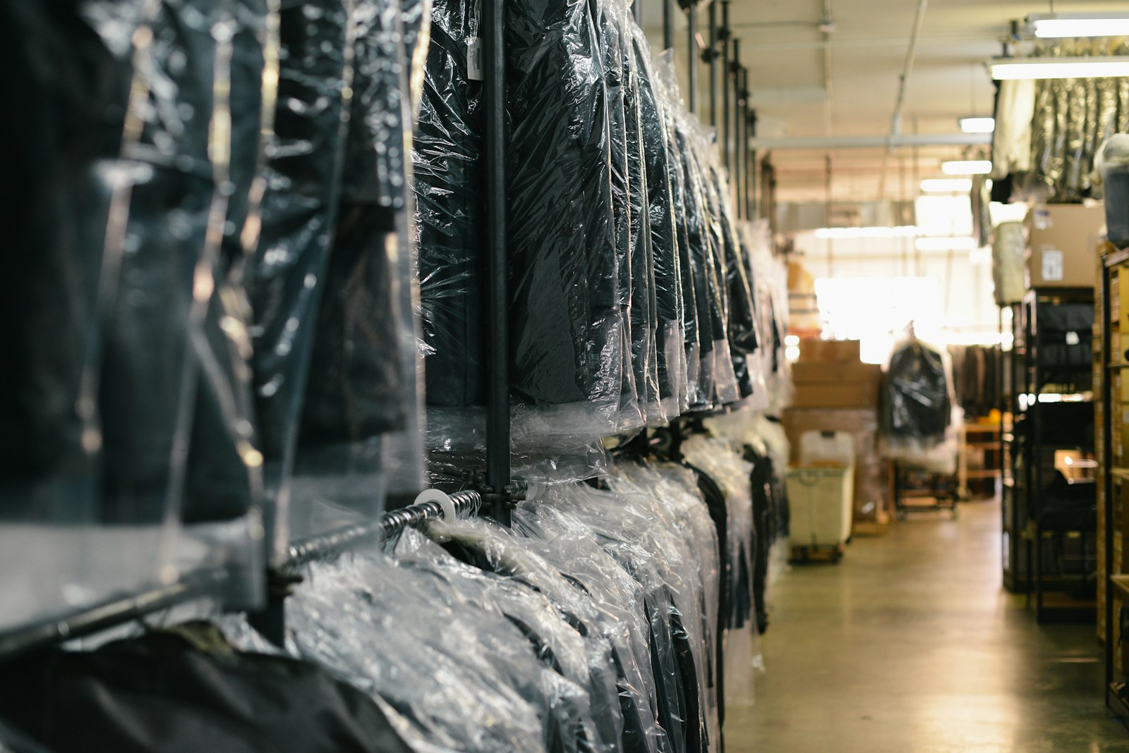 Photo by m0851 black suit hanging on rack